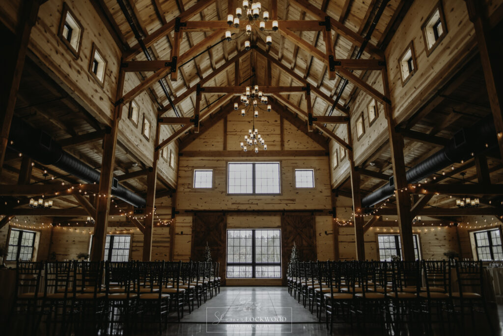 Barn Interior setup with chairs for a ceremony.