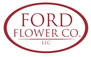 Logo for Ford Flower Co. LLC with maroon text inside a maroon oval outline on a white background.